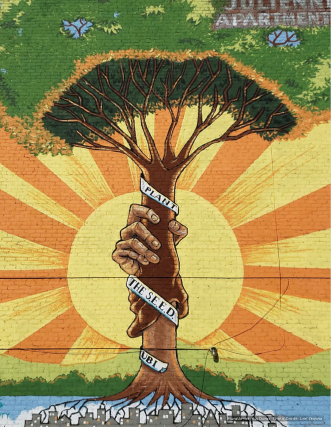 Mural in Stockton, California depicting a tree and promoting the SEED project